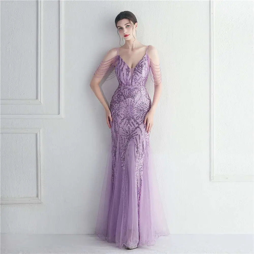 Lavender sequined mermaid gown with sheer illusion sleeves and fitted bodice for black mesh beaded bridal wedding dinner