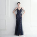 A navy blue mermaid-style black mesh beaded bridal wedding dinner gown with intricate sequin detailing and sheer straps
