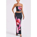 Black orchid fashion vacation women’s skirt set with black strapless two-piece featuring vibrant pink orchid prints