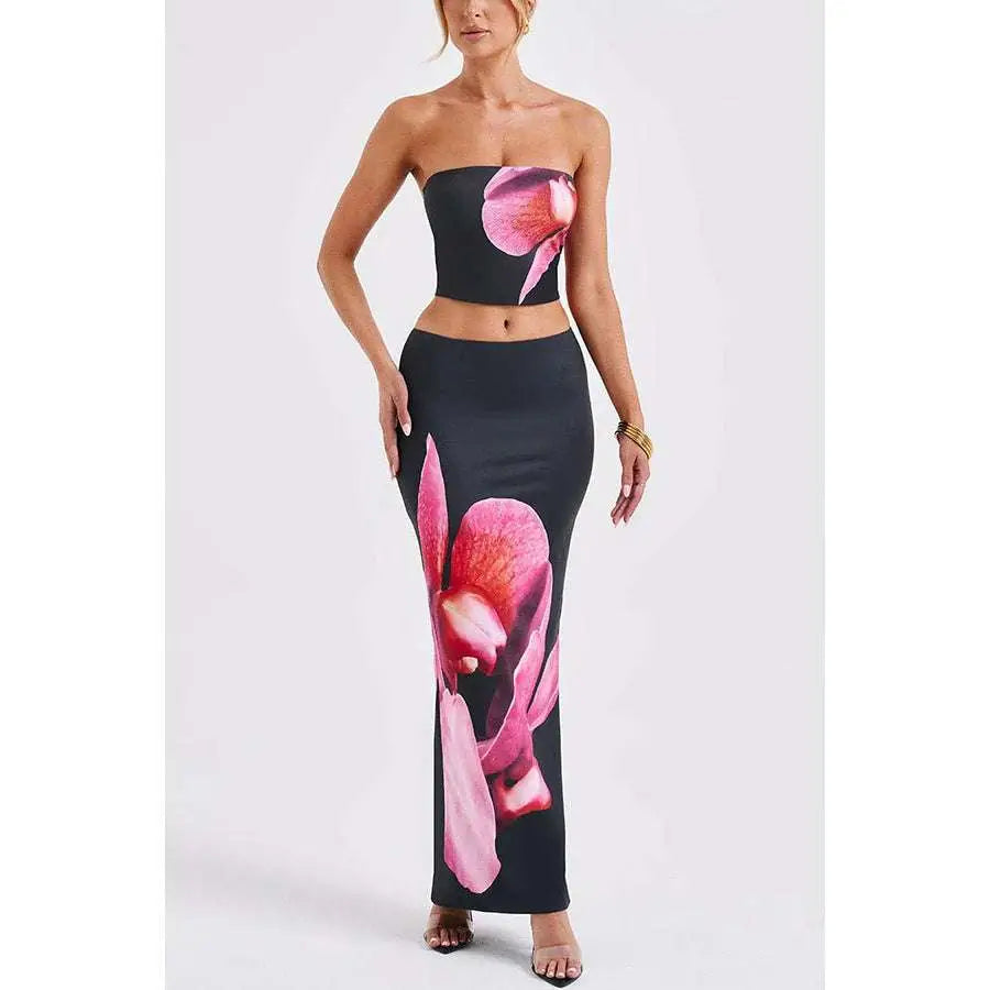 Black orchid fashion vacation women’s skirt set with black strapless two-piece featuring vibrant pink orchid prints