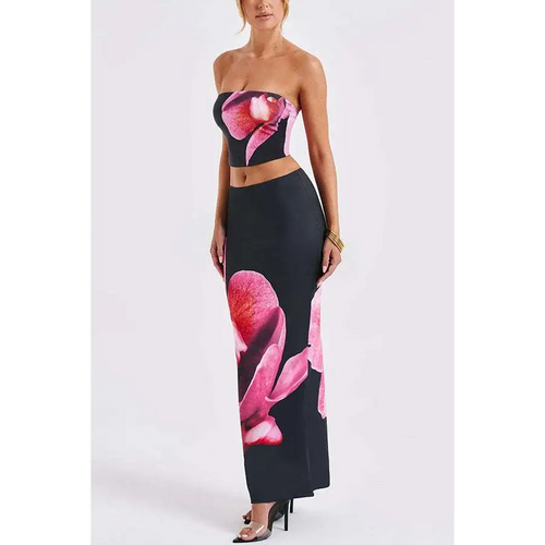 Black orchid fashion two-piece skirt set featuring a black strapless cropped top and vibrant pink orchid prints