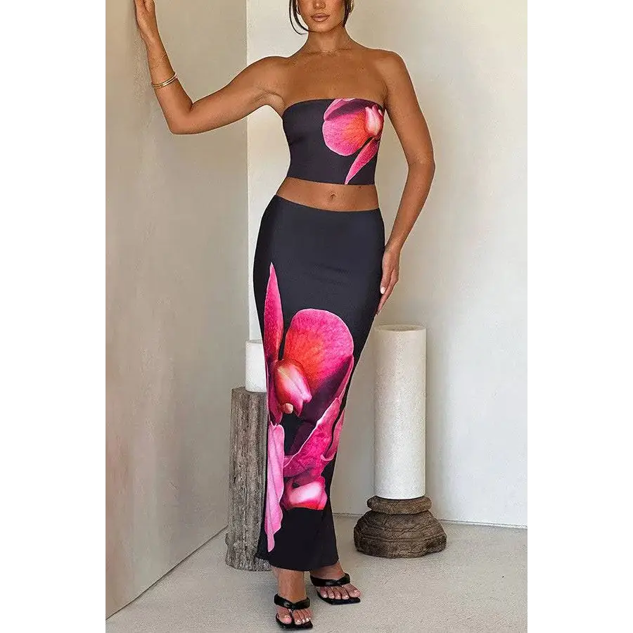 Black orchid fashion black strapless two-piece skirt set with vibrant pink orchid print for vacation wear