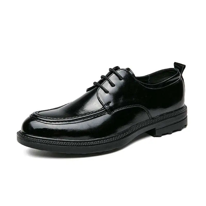 Black patent leather horsebit oxford shoe with glossy finish and textured rubber sole for male fashion formal wear
