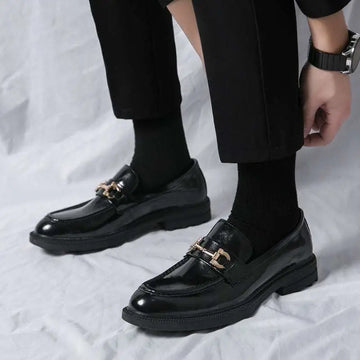 Black patent leather horsebit loafers male with gold-tone buckle and chunky rubber soles for male fashion formal wear