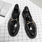 Black patent leather horsebit loafers male with gold tone buckle detailing for male fashion formal wear