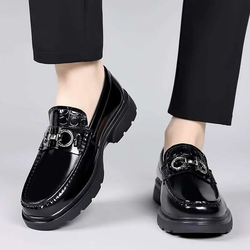 Black patent horsebit platform retro casual shoes featuring silver horsebit buckle and chunky soles