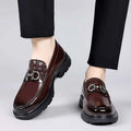 Brown patent leather loafers with glossy finish and silver horsebit buckle featuring embossed detailing retro casual shoes