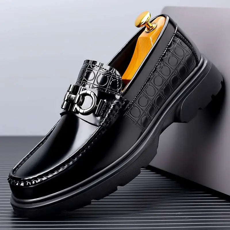 Black patent horsebit platform retro casual shoes with glossy finish and embossed circular pattern on side