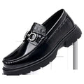 Black patent horsebit platform loafer with embossed crocodile pattern and silver horsebit buckle for retro casual shoes