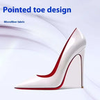 White high-heeled pump with pointed toe and red trim in microfiber fabric styled like black patent stiletto pointed toe shoes