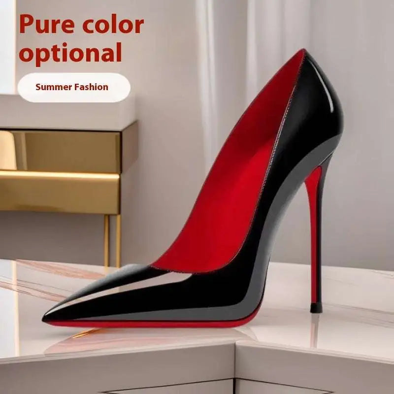 Black patent stiletto pointed toe high heel with signature red sole by christian louboutin