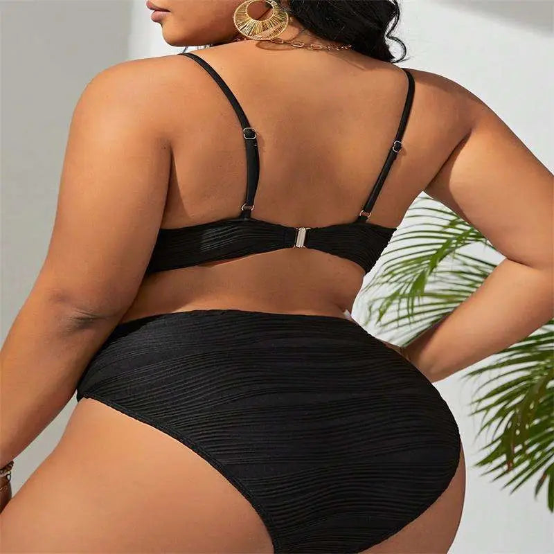 Black pleated bikini two-piece set featuring gold accents and v-shaped metal details on top and bottom