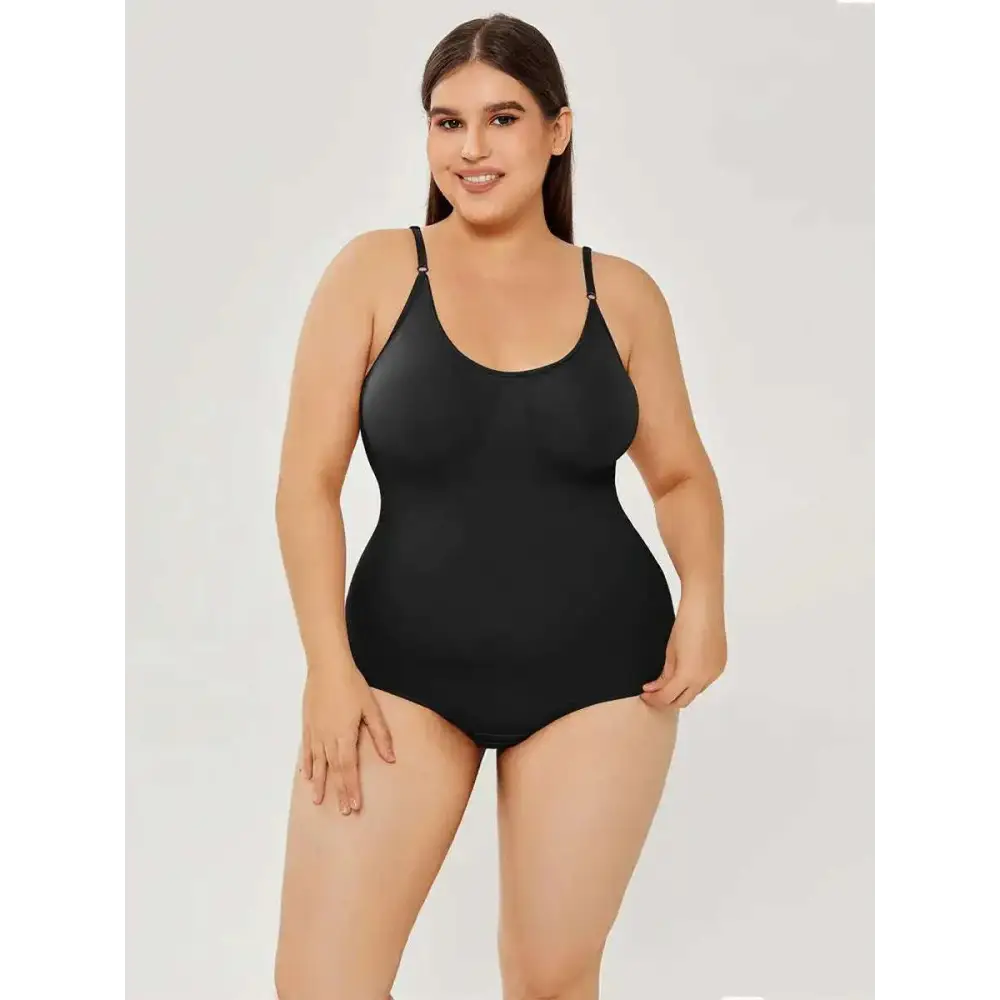 Black plus size women tummy control one-piece swimsuit with thin spaghetti straps and smooth form-fitting design