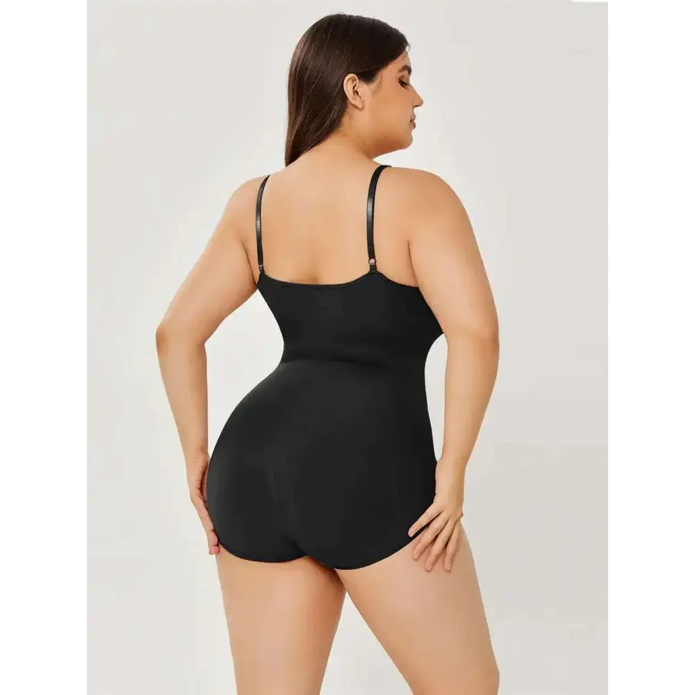 Black plus size women tummy control swimsuit with thin straps and smooth form fitting shapewear bodysuit design
