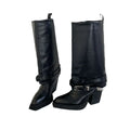 Black leather knee-high knight boots with chunky heel and silver buckle detail featuring pointed toe design