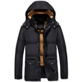 Black puffer velvet padded jacket with tan faux fur hood lining and silver buttoned front pockets for warmth and style