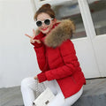 Red puffer jacket with fur-lined hood ideal for winter womens outerwear like a black quilted parka jacket