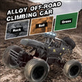 Black remote control rock crawler with black alloy frame, rugged tires, and rechargeable batteries for off-road climbing