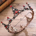 Ornate rose gold crown bridal headdress with black retro circle design and red black gemstones filigree detailing