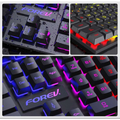 Black rgb four piece keyboard mouse headset bundle featuring a black gaming keyboard with rgb backlighting and textured keycaps