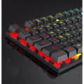 Black mechanical keyboard with red and yellow rgb backlighting in a black rgb four piece keyboard mouse headset bundle