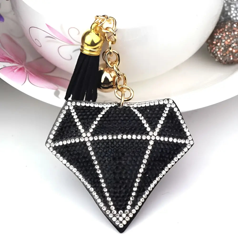 Black diamond-shaped bag pendant with sparkling rhinestones and gold-toned chain tassel and bell creative tassel accessory