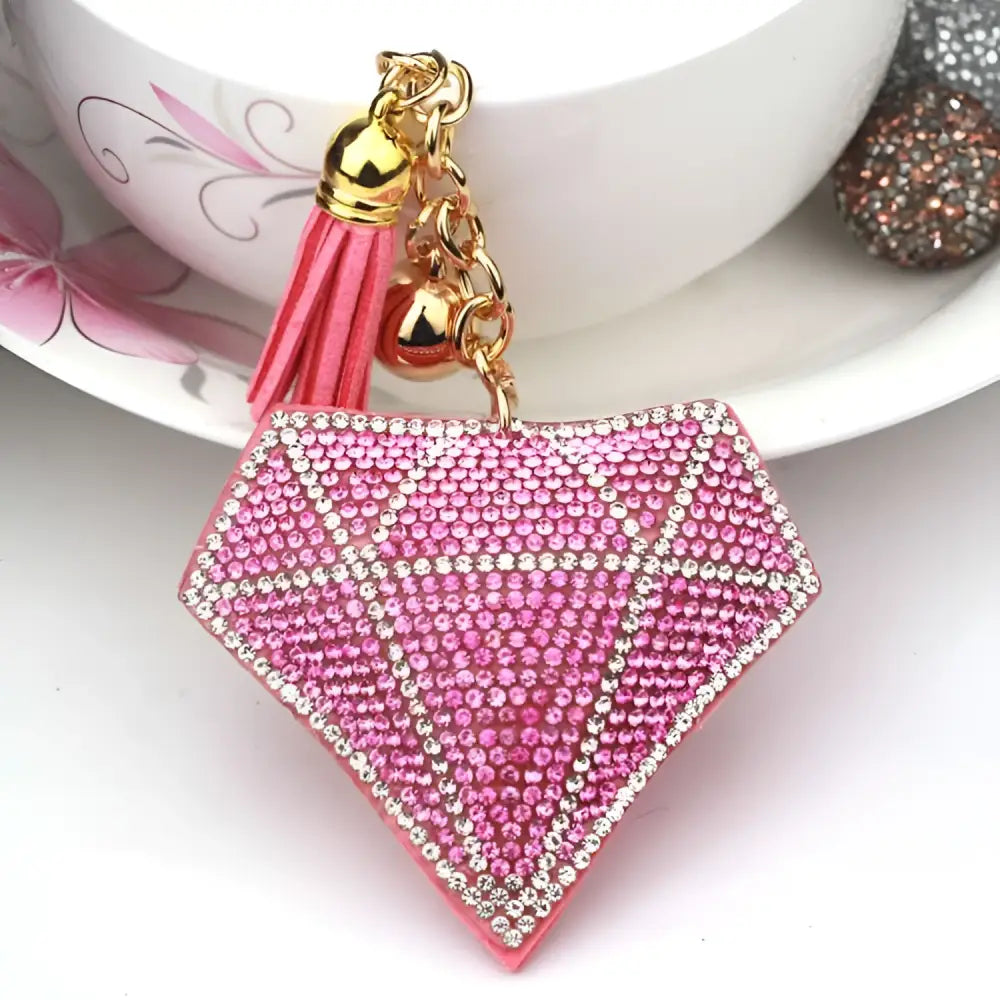 Pink diamond-shaped bag pendant adorned with rhinestones and a gold-toned creative tassel for bags