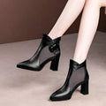 Black leather ankle boots with pointed toe chunky block heel and sheer mesh side panels, complementary to black rhinestone rose heel sandals mesh designs