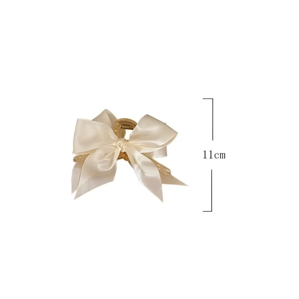 Cream satin female graceful bow grip with gold-toned metal base bow grip shark clip for elegant hairstyles