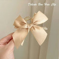 Beige satin female graceful bow grip hair clip with clear claw mechanism elegant bow grip shark style accessory