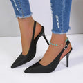 Black satin high heel sandals with pointed toe and slender heel in elegant slingback design