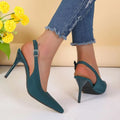 Teal suede high heel slingback with crystal buckle and pointed toe complementing black satin high heel sandals