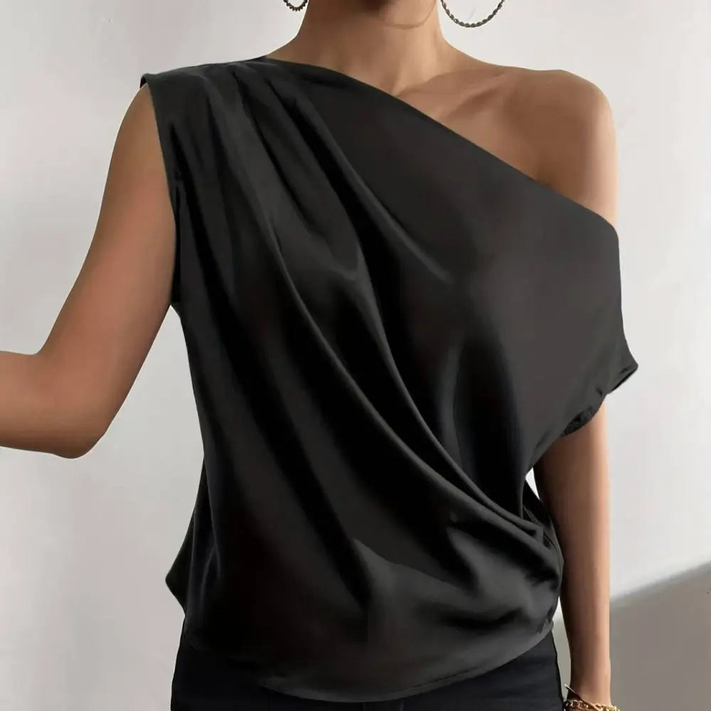 Black satin solid one-shoulder top with draped fabric and a sleek solid color asymmetrical collar design