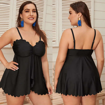 Black scalloped plus size bottoms two piece set featuring a ruched bodice one-piece swimsuit with thin straps
