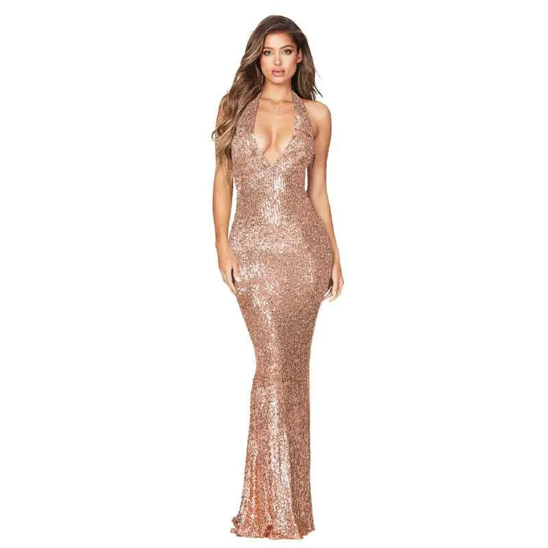 A shimmering rose gold sequined halter backless dress with deep v halter and mermaid silhouette