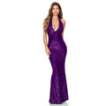 A shimmering purple sequined halter backless dress with deep v halter and mermaid silhouette shown from the back side