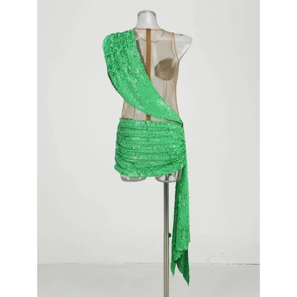 Vibrant emerald green sequined mini dress with draped asymmetrical one-shoulder design for elegant occasions
