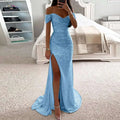 A shimmering light blue off-the-shoulder sequined gown with high slit and flowing train for evening wear