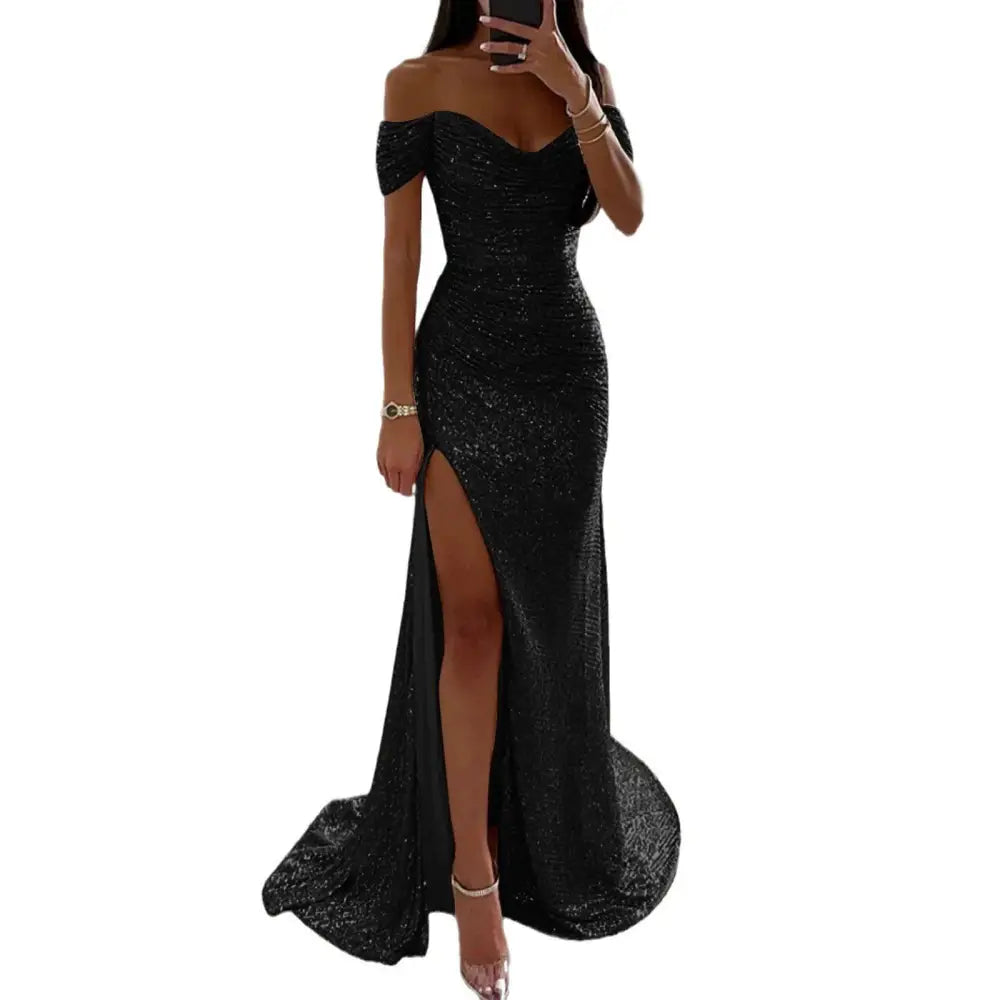 Black sequined off-the-shoulder gown with high slit and flowing train for elegant evening wear