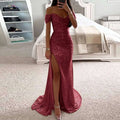 A shimmering rose gold sequined off-the-shoulder gown with a high slit and flowing train for elegant occasions