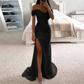Black sequined off-the-shoulder gown with a high slit and flowing train for elegant evening wear
