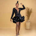 Black sequined v neck banquet ball party dress featuring a long sleeve and voluminous ruffled skirt