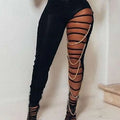 Black sheer gold chain casual sexy ripped leggings featuring gold chain detailing on black sheer fabric