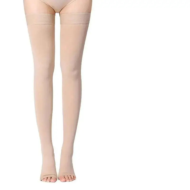 Beige sheer full-length therapy varicose vein stockings with smooth seamless design and reinforced elastic top bands