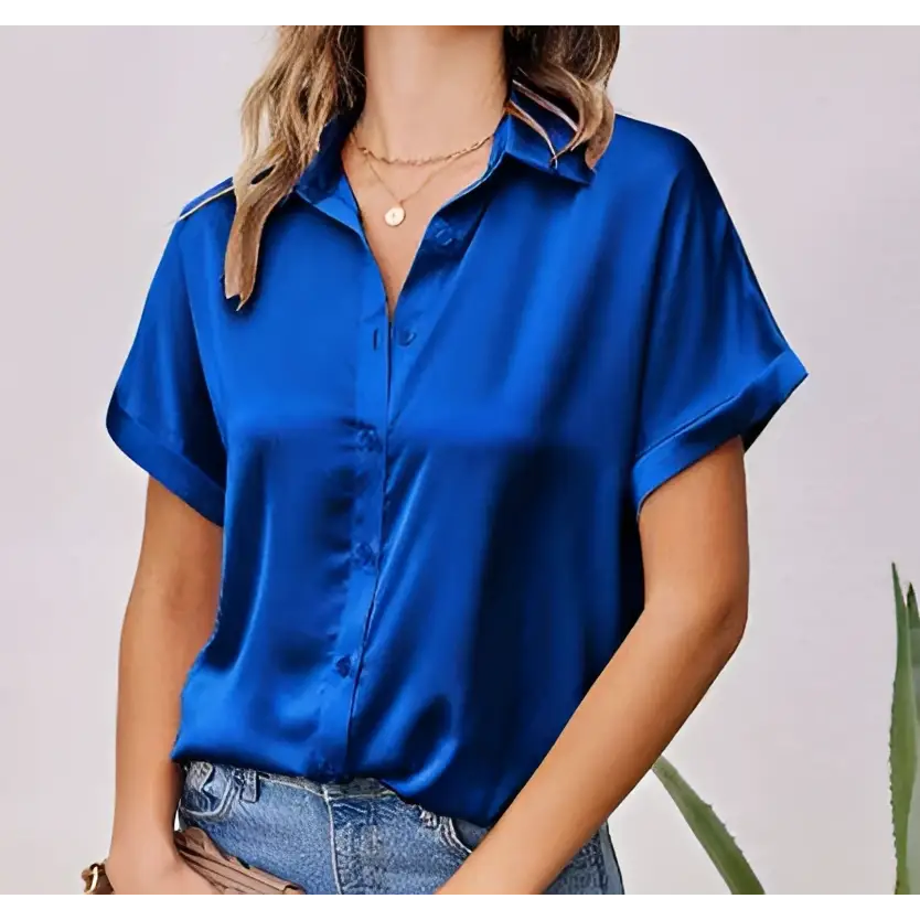A vibrant royal blue satin button shirt with short sleeves and a classic button down collar