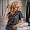 Black short sleeve satin button shirt featuring a sleek black satin button shirt design with short sleeves