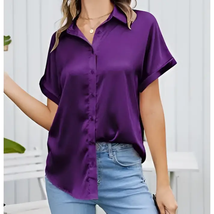 Purple satin short-sleeved button-up shirt paired with black short sleeve satin button shirt for elegant style