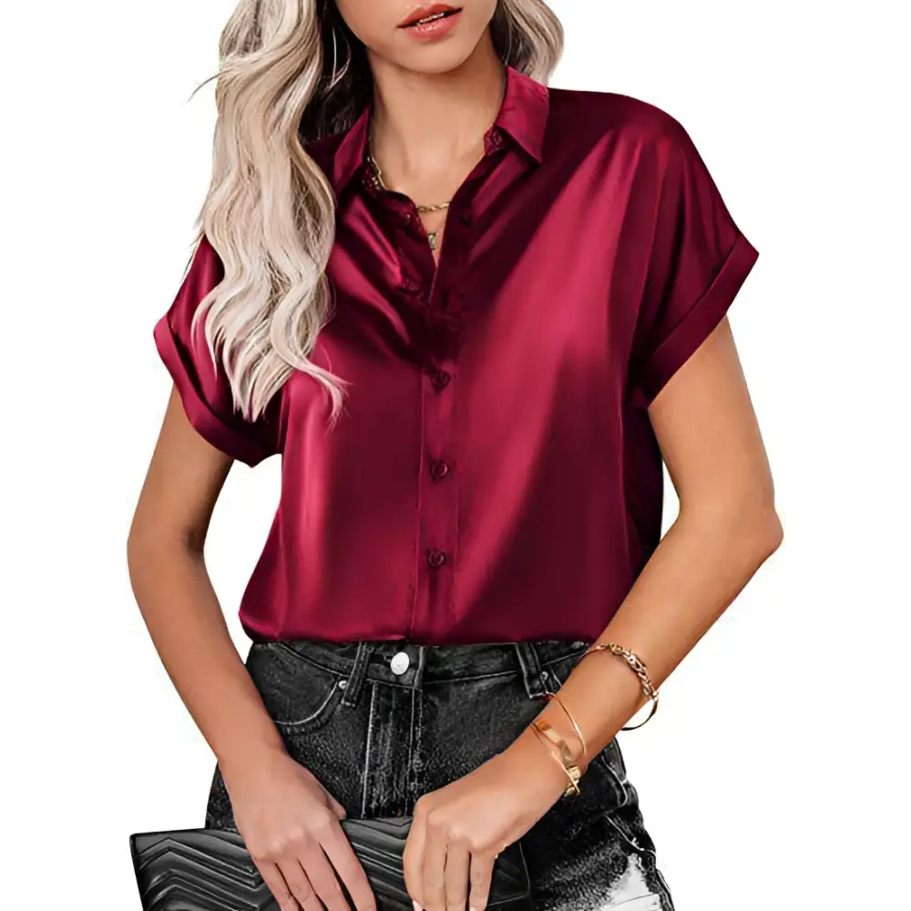 A satin button shirt in burgundy with short sleeves, classic collar, and rolled cuffs for a refined look