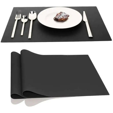 Black silicone placemat heat resistant table mat with a smooth matte finish in a 2 pack set