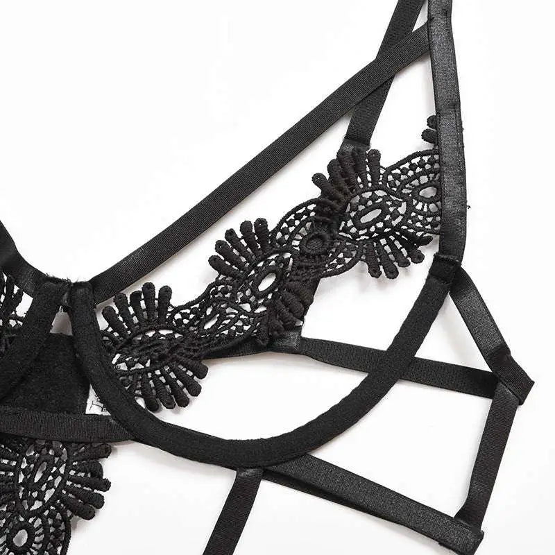 Black solid color lace bodysuit with intricate floral patterns and adjustable satin straps in black lace lingerie bra style